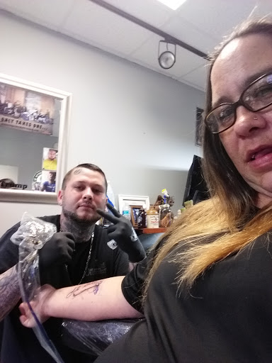 Explore family names tattoo ideas for guys, creative tattoo ideas in Auburndale, available at Soldiers Of Ink