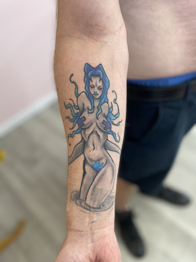 Explore roman numeral tattoo ideas for guys, creative tattoo ideas in Radcliff, available at The Pink Toadstool Tattoo