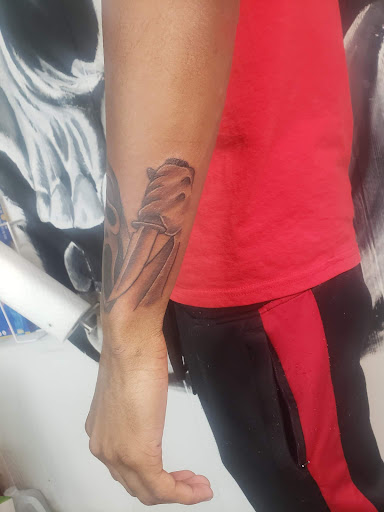 Explore tattoo ideas hands, creative tattoo ideas in Decatur, available at Exclusive Ink Tattoos & Body Piercings 22nd & Wood