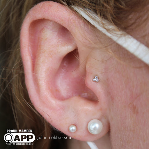 Explore peace tattoo ideas, creative tattoo ideas in Fort Myers, available at Tiger Lotus Tattoo and Piercing