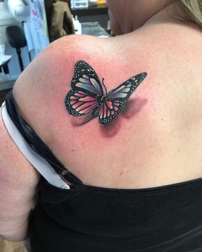 Explore tattoo ideas for breast cancer ribbon, creative tattoo ideas in Hendersonville, available at Endless Kreations Custom Tattoo & Piercing LLC