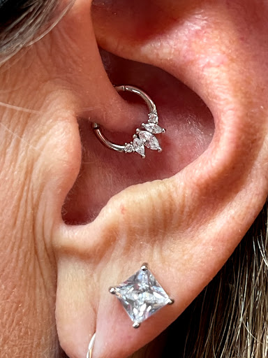 Explore mens behind ear tattoo ideas, creative tattoo ideas in Victoria, available at TRIED and True Tattoos Piercings