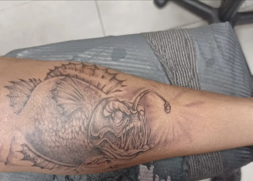 Explore tattoo ideas with flowers and names, creative tattoo ideas in Port Aransas, available at SHARK ATTACK TATTOO