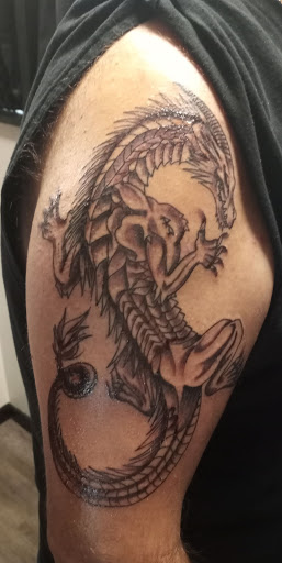 Explore cross sleeve tattoo ideas, creative tattoo ideas in Bradford, available at Cutthroat Tattoo