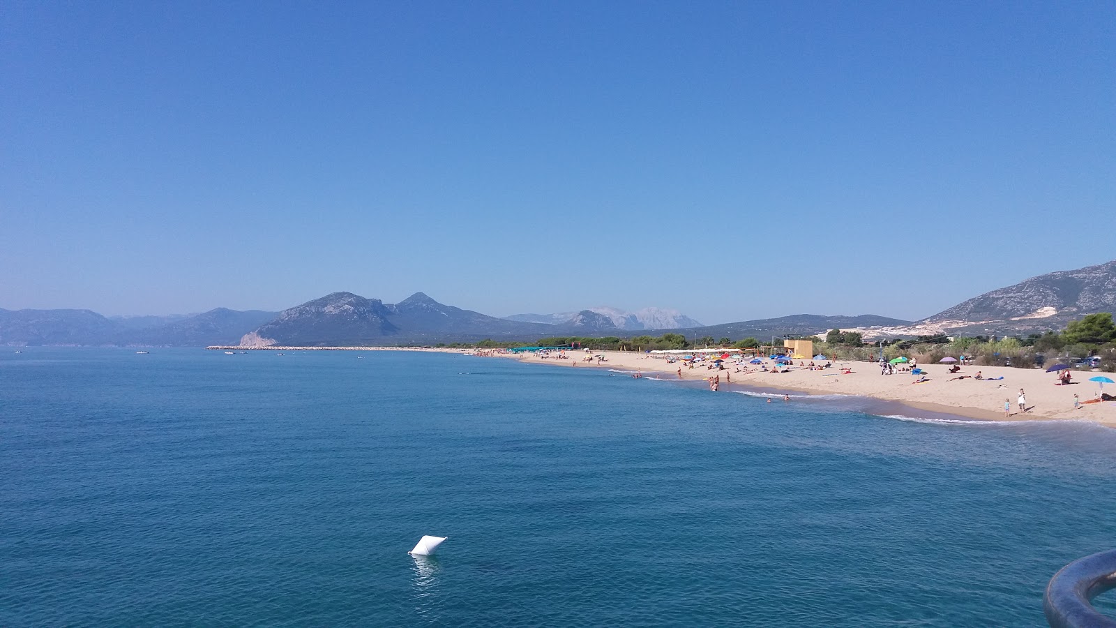 Fotografie cu Spiaggia Marina di Orosei cu o suprafață de nisip beige