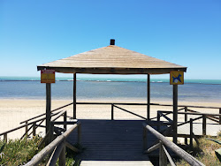 Photo de Playa el Camaleon avec rivage droit, long