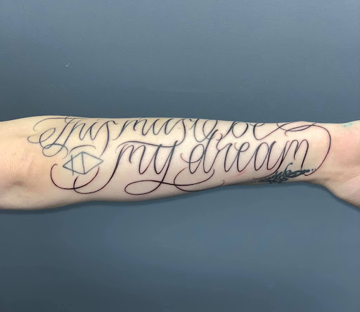 Explore behind the ear tattoo ideas, creative tattoo ideas in Florissant, available at St. Louis Ink