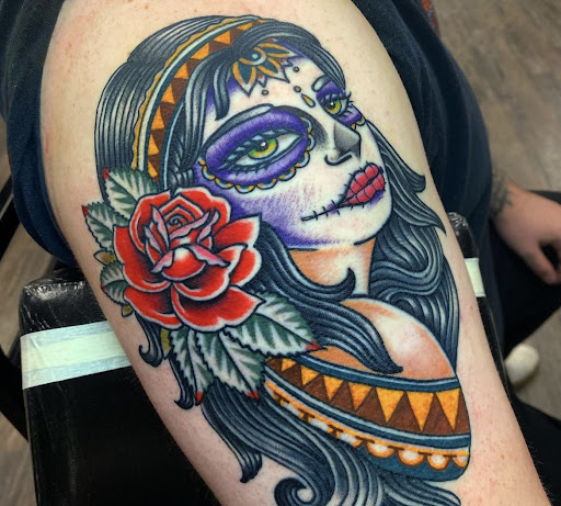 Find tattoo between breast ideas for your next unique tattoo in San Leandro at Pastime Tattoo