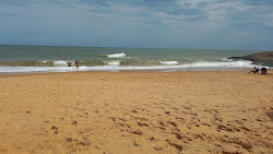 Photo de Plage de Pau Grande protégé par des falaises