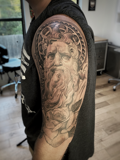 Explore feminine tattoo sleeve ideas, creative tattoo ideas in Magnolia, available at Mr. Grays Tattoo Studio