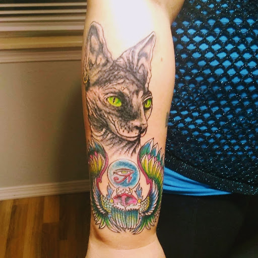 Explore tattoo ideas on rib cage, creative tattoo ideas in Lexington, available at Tempest Tattoo Studio