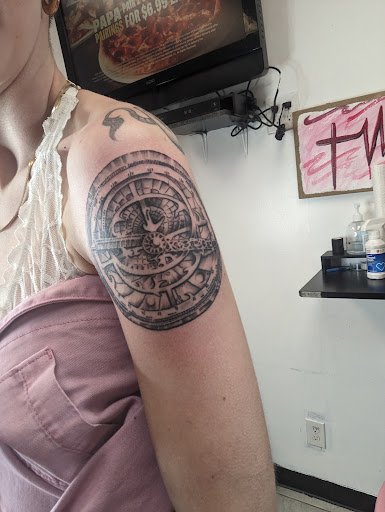 Explore armband tattoo ideas for men, creative tattoo ideas in Louisville, available at Zoes Tattoos & Piercings