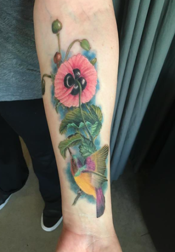 Explore tattoo ideas for women in arm, creative tattoo ideas in Atlanta, available at Empyrean Tattoo Studio
