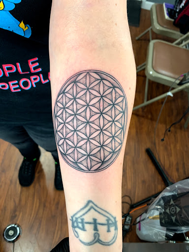 Explore womb tattoo ideas, creative tattoo ideas in Harrisville, available at Cloud 9 Tattoo Company