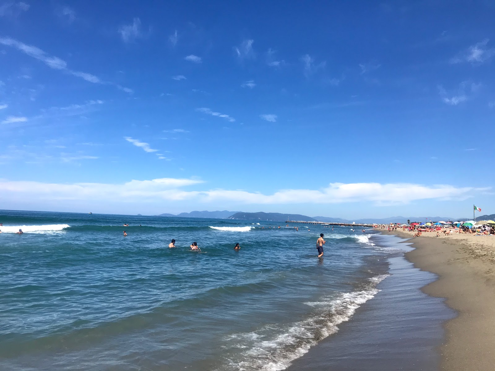 Fotografija Spiaggia Le Dune z svetel pesek površino