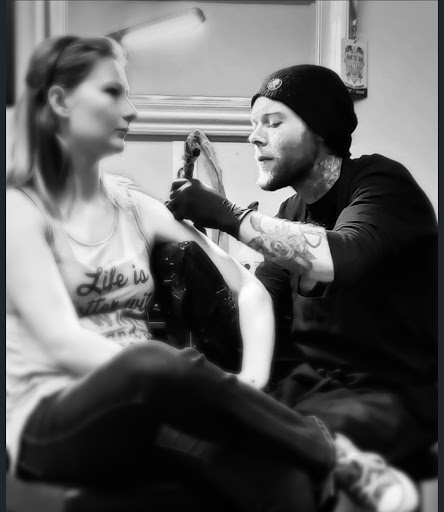 Explore ideas for spine tattoos, creative tattoo ideas in Roscoe, available at Elevated Ink Tattoo