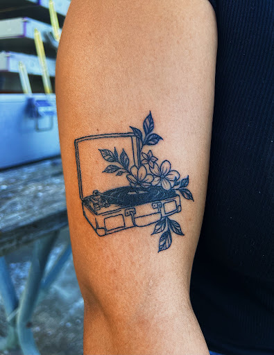 Explore tattoo ideas on thigh, creative tattoo ideas in Lawrence, available at Red 5 Tattoo