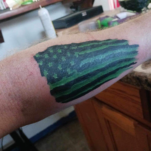 Explore 1of1 tattoo ideas, creative tattoo ideas in Des Moines, available at Adrenaline Studios Tattoo