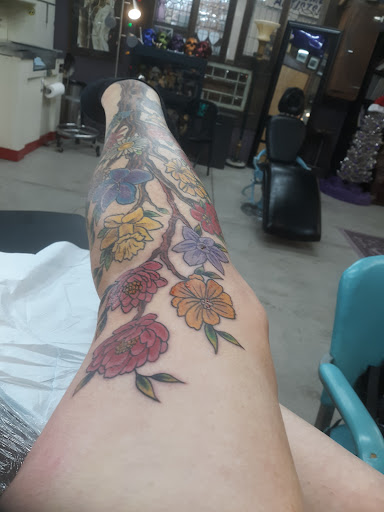 Explore sleeve tattoo ideas for ladies, creative tattoo ideas in Wichita, available at Artist At Large Tattoo