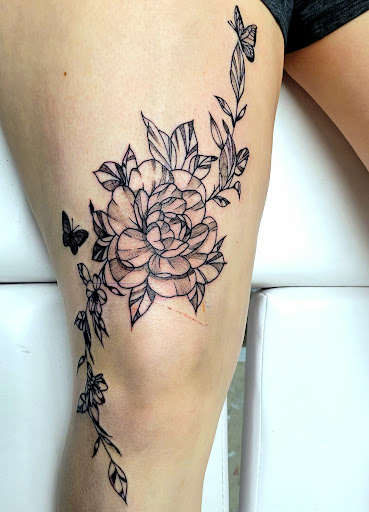 Explore fine line hand tattoo ideas, creative tattoo ideas in Dickinson, available at The Empty Canvas Tattoo