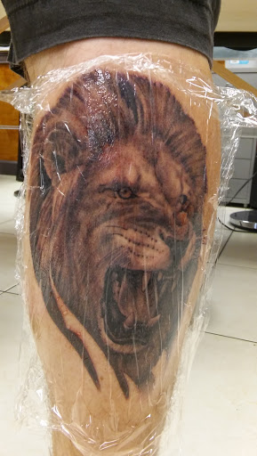 Tattoo Shop «Rise Above Tattoo», reviews and photos, 1009 N Mills Ave, Orlando, FL 32803, USA