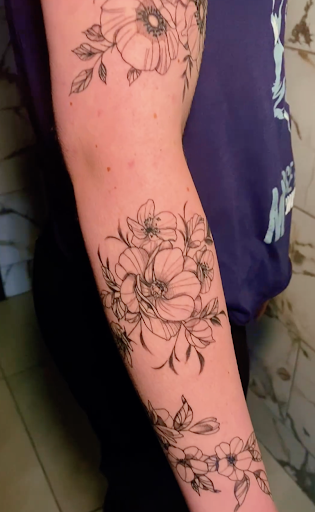 Find tropical flower tattoo ideas for your next unique tattoo in Plano at Vixen Body Art