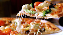 Plats et boissons du Pizzeria L'AME DE LA PIZZA à Combourg - n°1