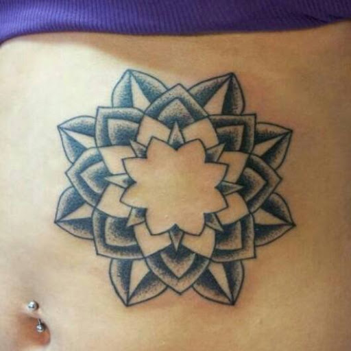 Explore tiger lily tattoo ideas, creative tattoo ideas in Asheboro, available at Blue Luna Tattoo Company, LLC