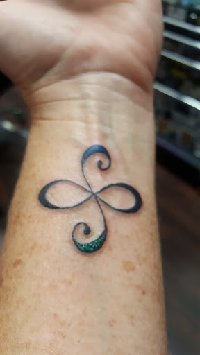 Explore tattoo ideas for someone who passed away, creative tattoo ideas in Dubuque, available at The Crows Nest