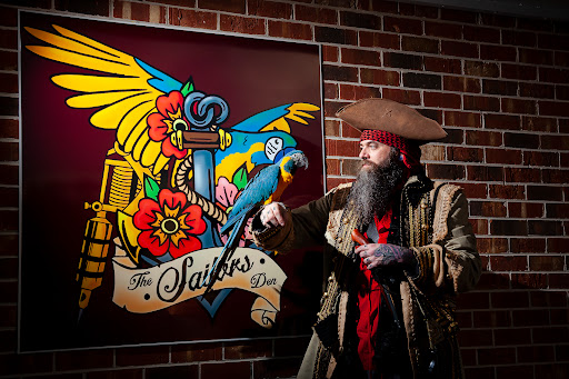 Explore tattoo ideas with flowers and names, creative tattoo ideas in Chattanooga, available at The Sailors Den Tattoos and Piercing & The Scurvy Pearl Music Venue