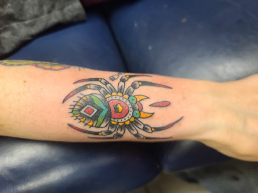 Explore neck tattoo ideas men, creative tattoo ideas in Foley, available at Symbolic Ink Tattoo Studio