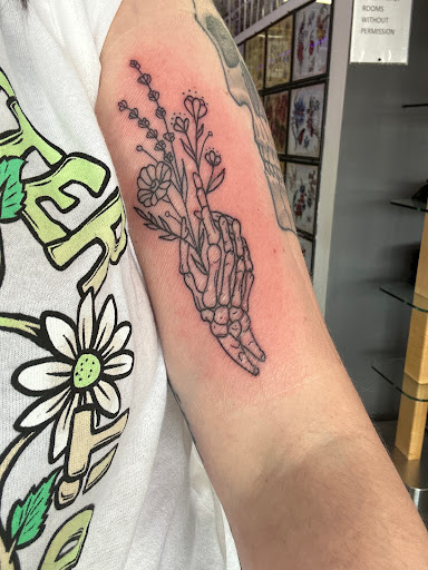 Explore cheating death tattoo ideas, creative tattoo ideas in Pigeon Forge, available at Black Orchid Tattoo Studio