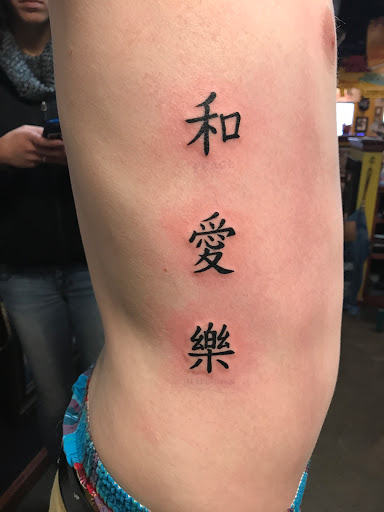 Explore female tattoo ideas ribs, creative tattoo ideas in Asheville, available at Serpent & the Rainbow Tattoo