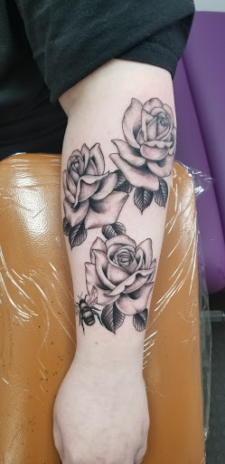 Explore son tattoo ideas for dad, creative tattoo ideas in Sioux City, available at Thorn-Side Tattoo & Piercing