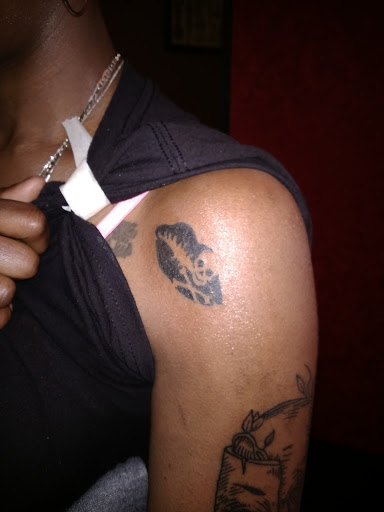 Find cool armband tattoo ideas for your next unique tattoo in Shelbyville at We the People Tattoo