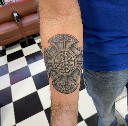 Explore left hand tattoo ideas, creative tattoo ideas in Kenosha, available at Kenosha Tattoo Company