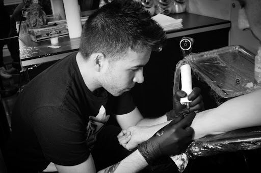 Explore bible verse tattoo ideas for guys, creative tattoo ideas in Miami Beach, available at Salvation Tattoo Lounge
