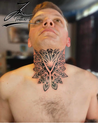 Explore rip cross tattoo ideas, creative tattoo ideas in Williamsport, available at Moa Tattoos