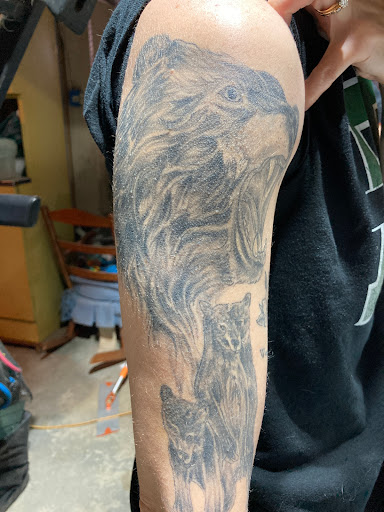 Explore barbell tattoo ideas, creative tattoo ideas in Old Orchard Beach, available at Mad Hatters Tattoo Studio