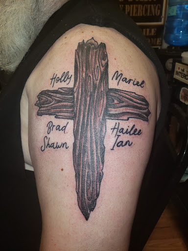 Explore tattoo ideas for men with daughters, creative tattoo ideas in Export, available at Patriotic pain tattoo