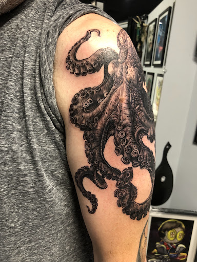 Explore tattoos inner bicep ideas, creative tattoo ideas in Englewood, available at Point of Entry Tattoo