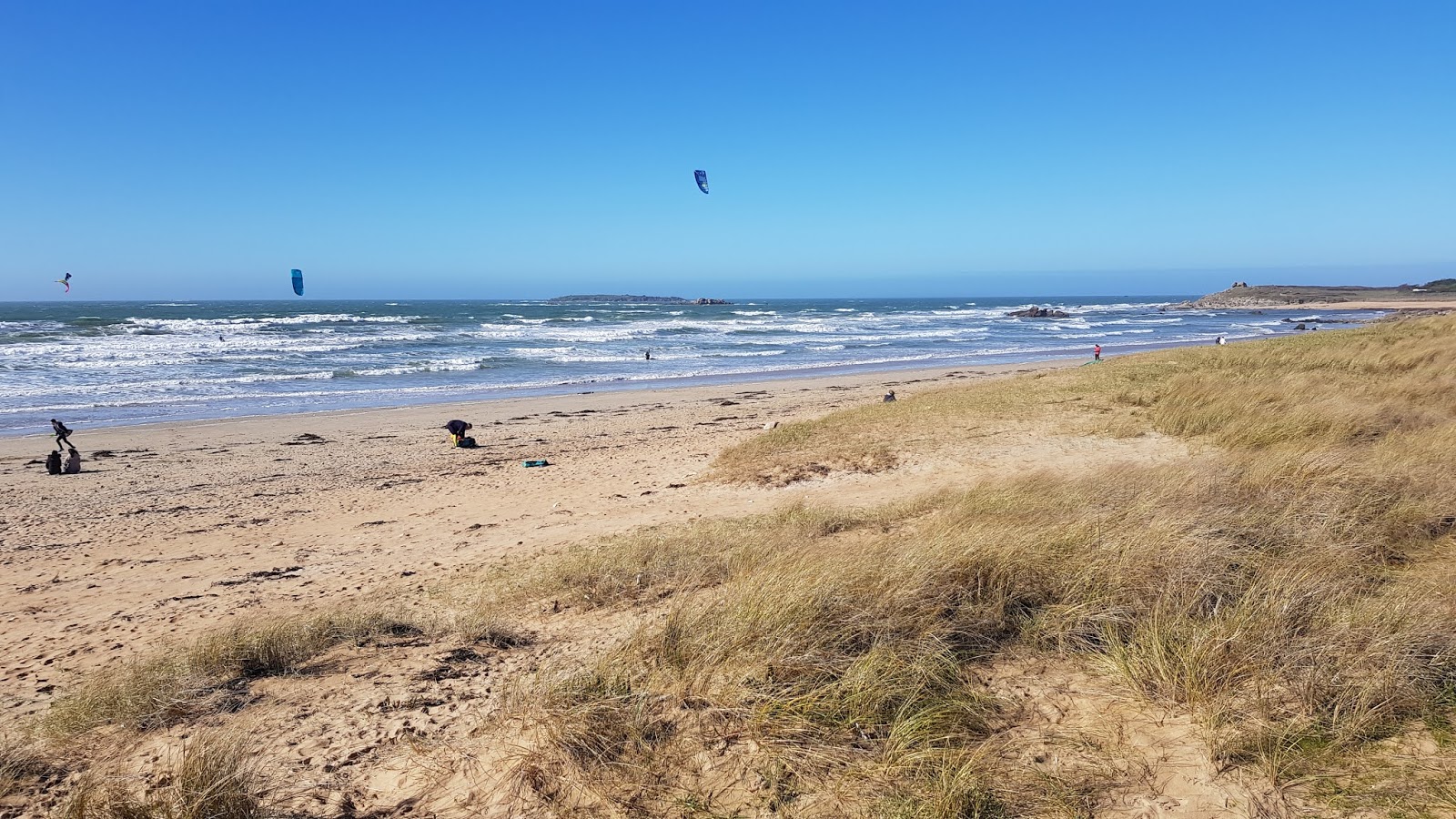 Fotografija Plage de Kerhillio z dolga ravna obala