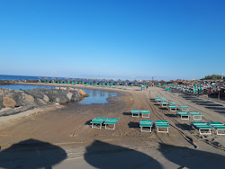 Photo de Torre Flavia Beach avec baie longue