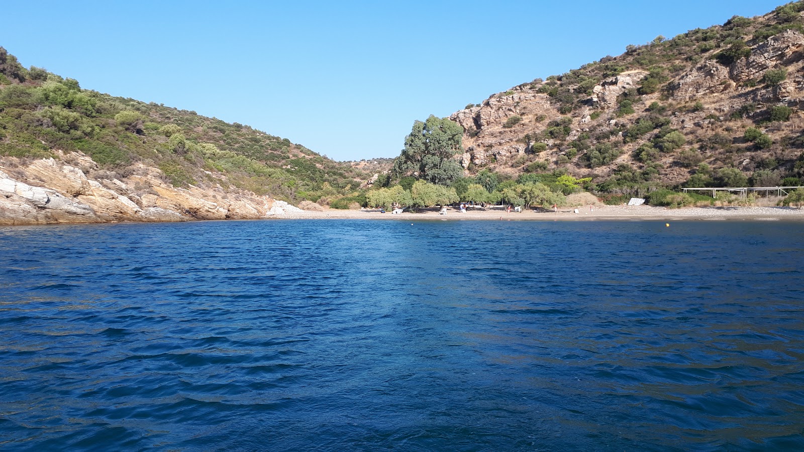 Photo de Kolpos Idras avec l'eau cristalline de surface