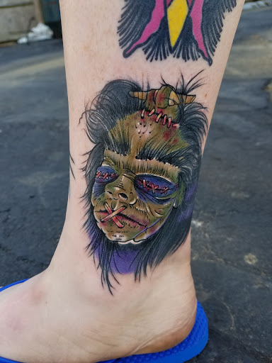 Explore december birth flower tattoo ideas, creative tattoo ideas in Owensboro, available at Hooded Crow Tattoo