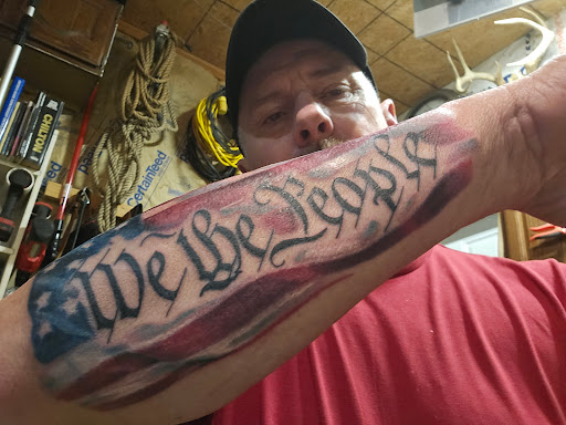 Explore barbed wire tattoo ideas, creative tattoo ideas in Davenport, available at Tooth & Nail Tattoo & Piercing