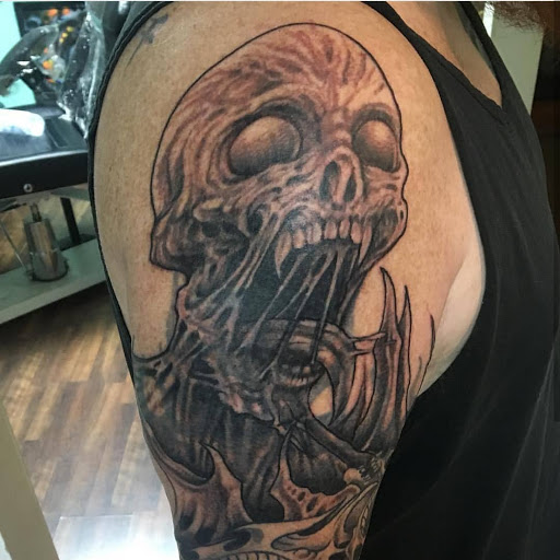Find dc tattoo ideas for your next unique tattoo in Reno at Evolution Tattoo