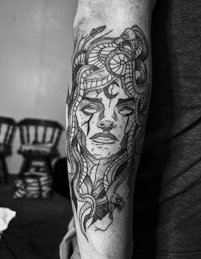 Explore tattoo ideas for lesbians, creative tattoo ideas in Burley, available at Fine Line Ink