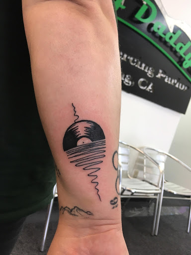 Explore feet tattoo ideas, creative tattoo ideas in Redding, available at Caddy Daddys