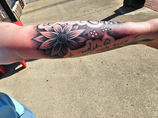 Explore olive branch tattoo ideas, creative tattoo ideas in Anderson, available at Obsidian Ink